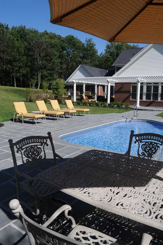 Outdoor kitchen, pool, and retreat