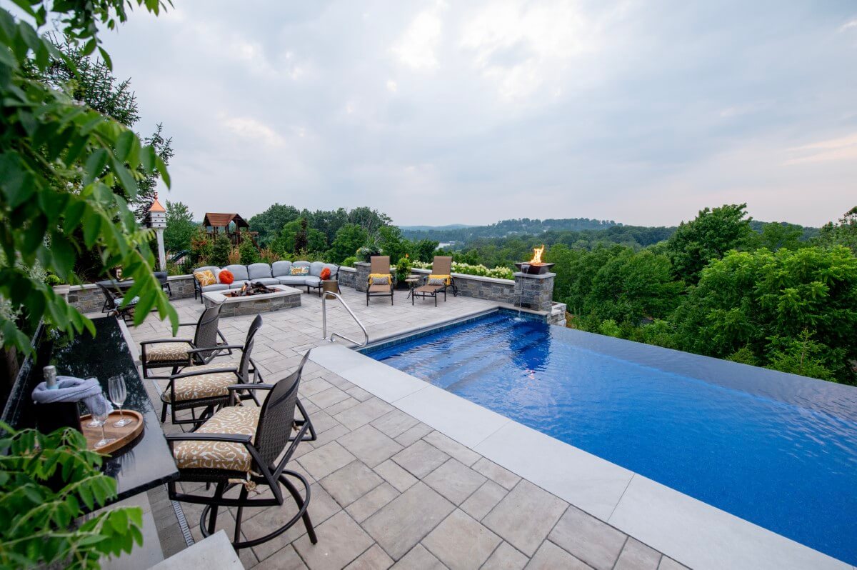 Outdoor kitchen, pool, and retreat