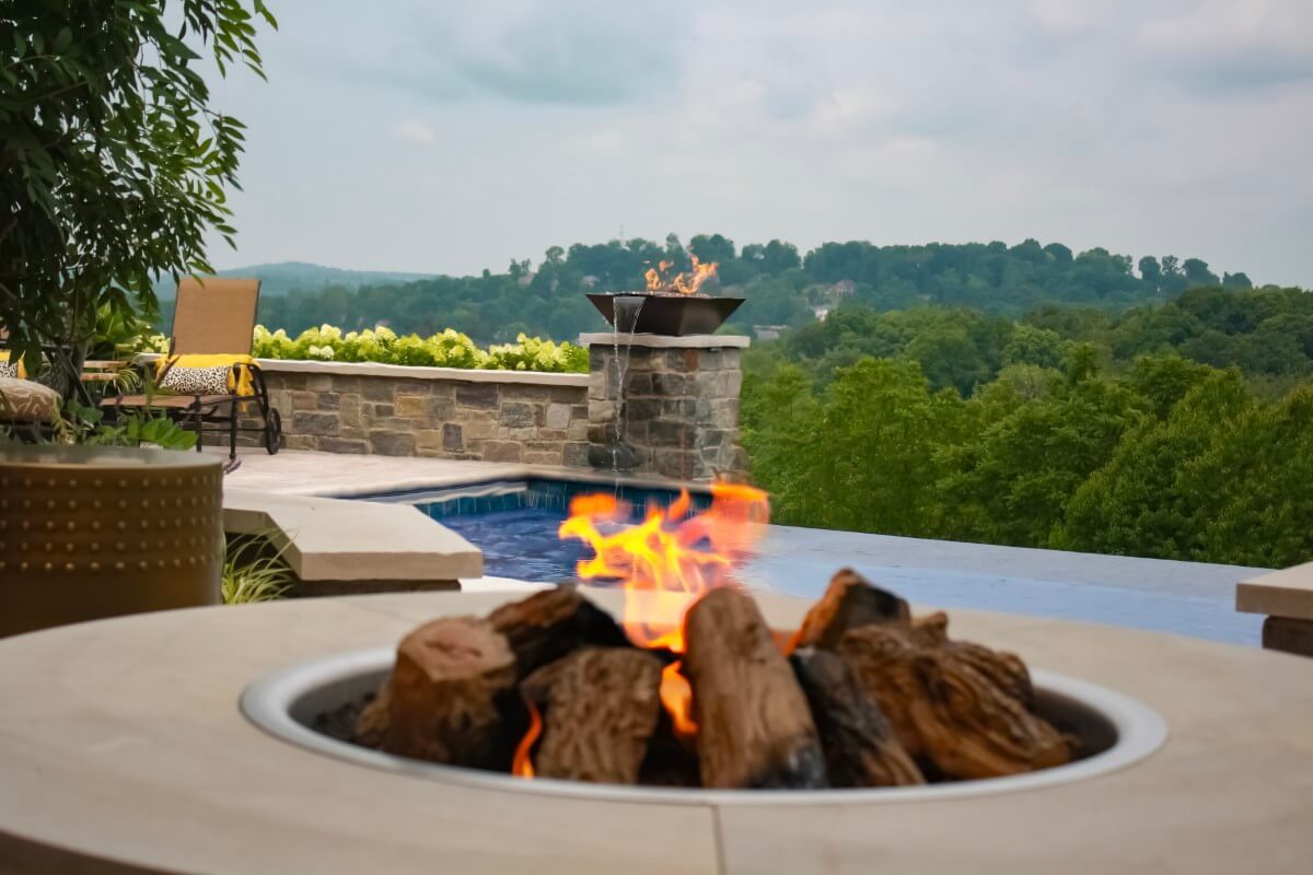 Outdoor kitchen, pool, and retreat