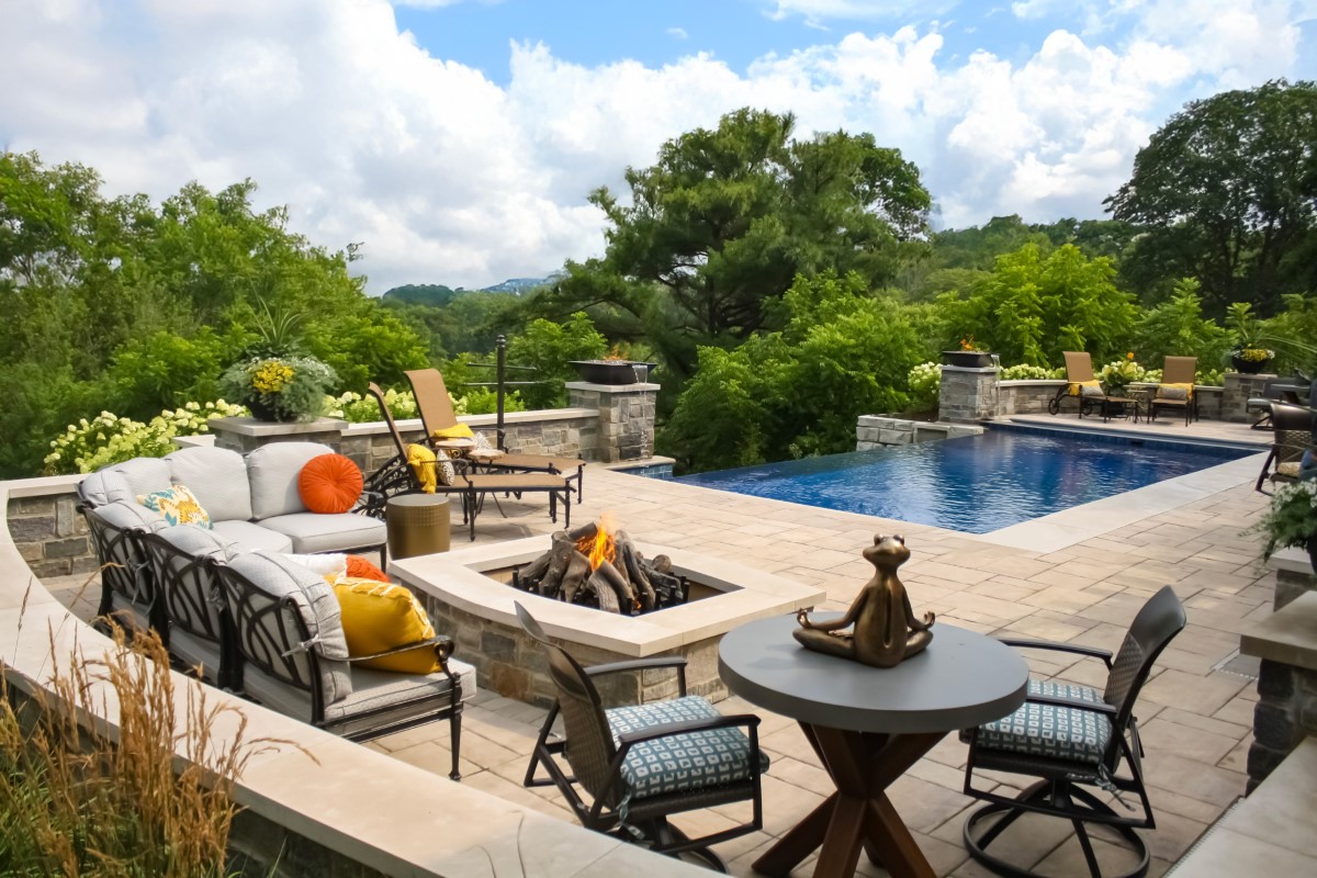 Outdoor kitchen, pool, and retreat