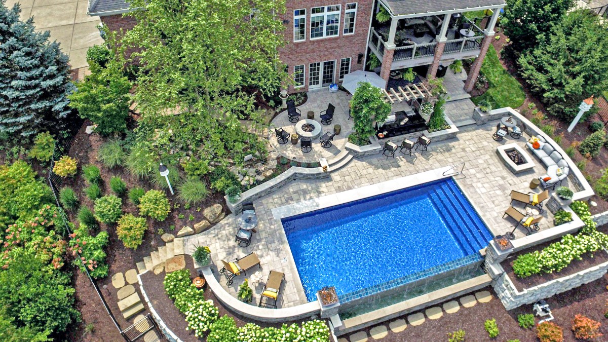 Outdoor kitchen, pool, and retreat